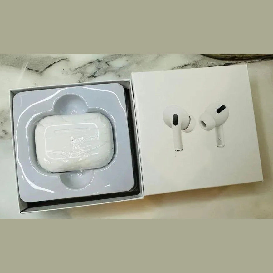 Wireless earbuds with charging case in open white box on marble surface