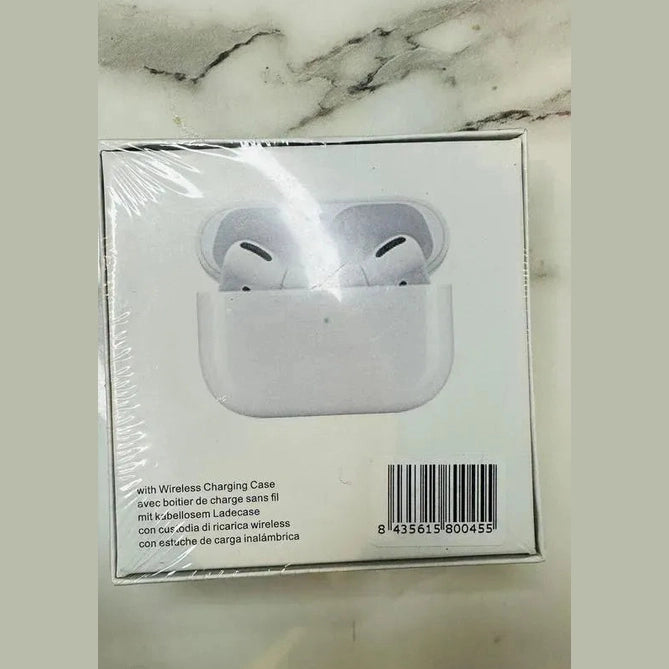 Wireless earbuds in charging case box on marble background, barcode and product details visible